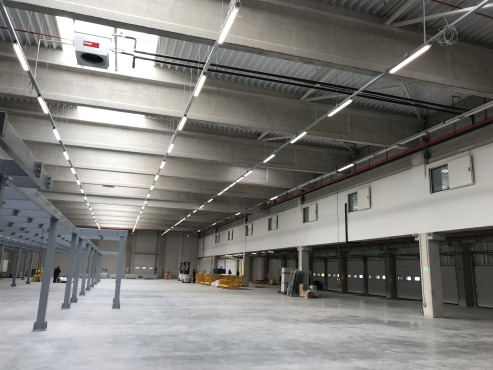 DHL логистична база в София с ефективно отопление от Ховал с покривни децентрализирани апарати TopVent и кондензен газов котел UltraGas